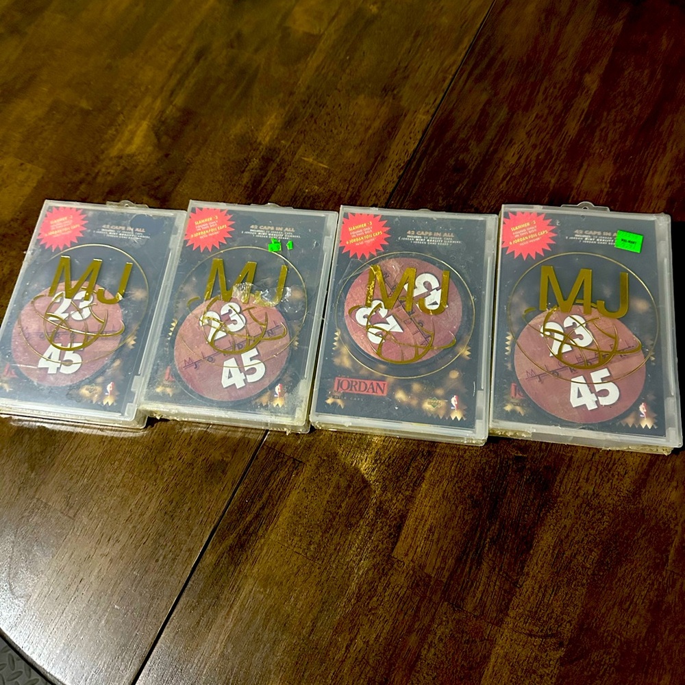 Rare!!! 4 unopened packs of pogs and slammers Jordan collection!